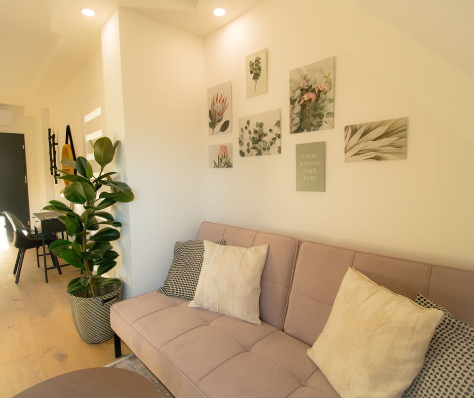 Deluxe Apartment | Living area | 45-inch Smart TV with digital channels, Netflix, heated floors