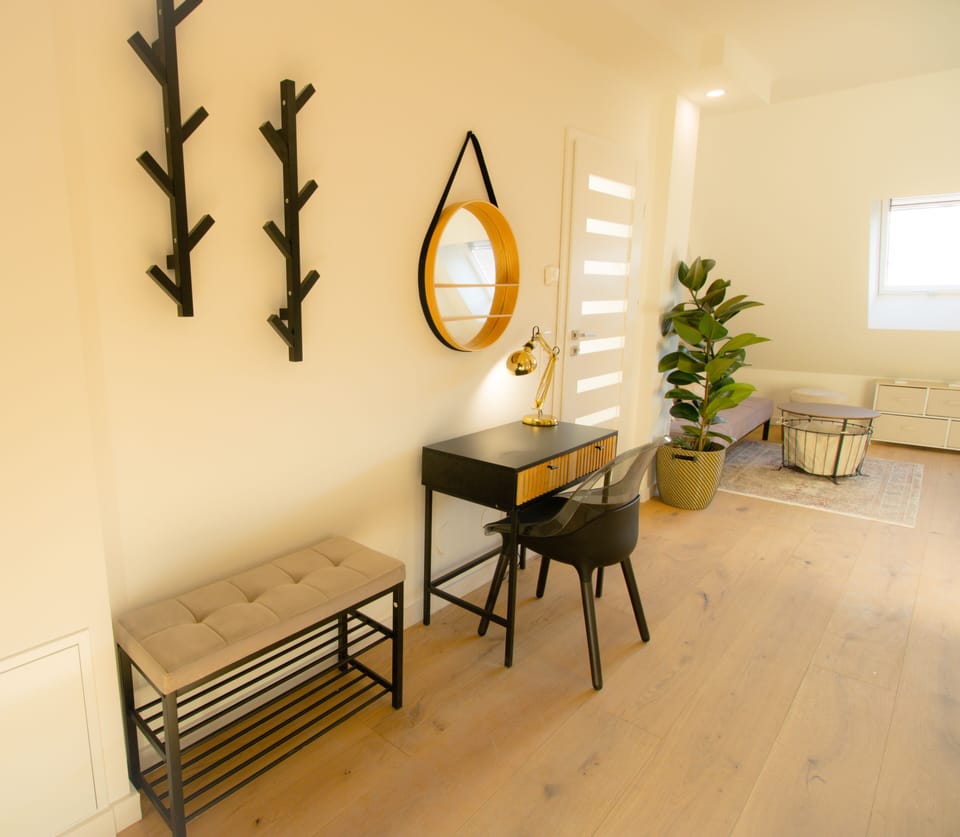 Deluxe Apartment | Living area | 45-inch Smart TV with digital channels, Netflix, heated floors