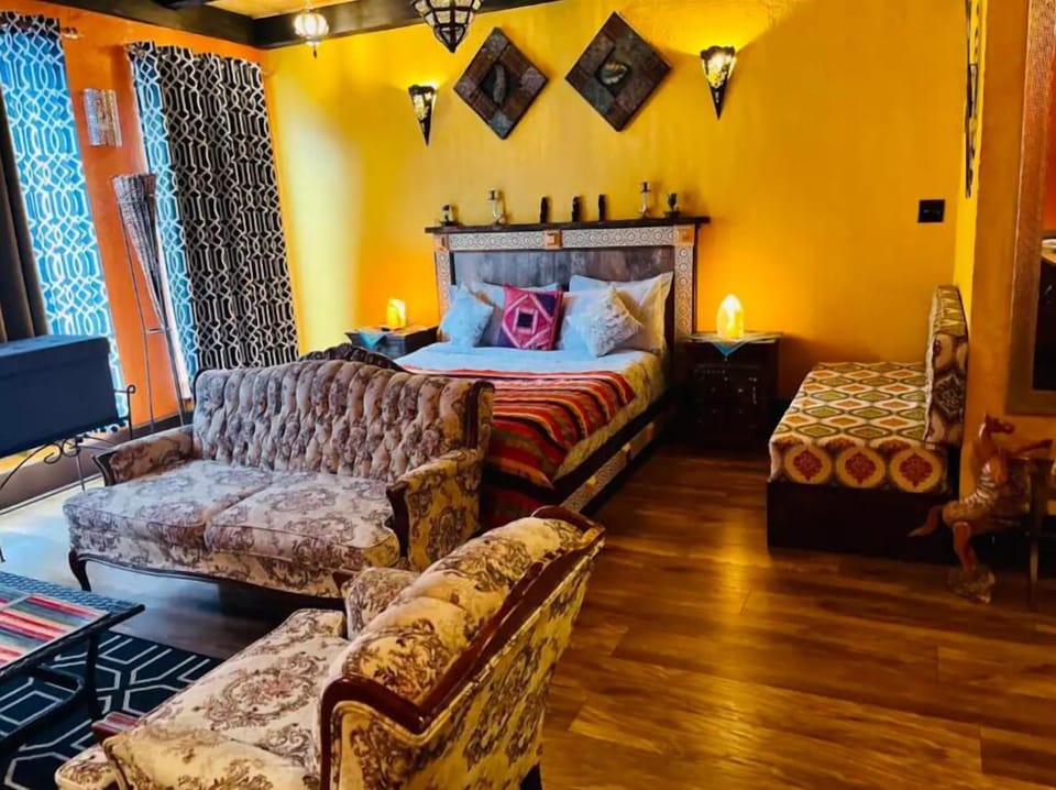 Luxury Suite | Premium bedding, down comforters, blackout drapes, iron/ironing board