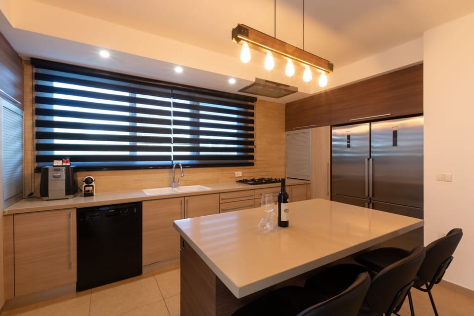 Villa | Private kitchen | Full-size fridge, microwave, oven, stovetop