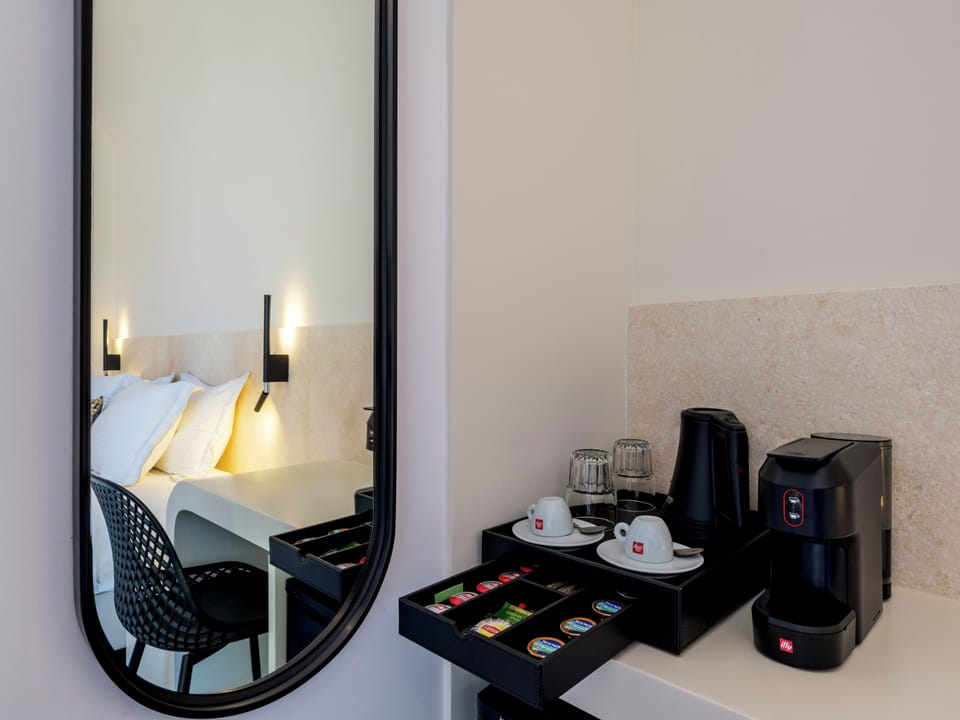 Premium bedding, memory foam beds, minibar, in-room safe