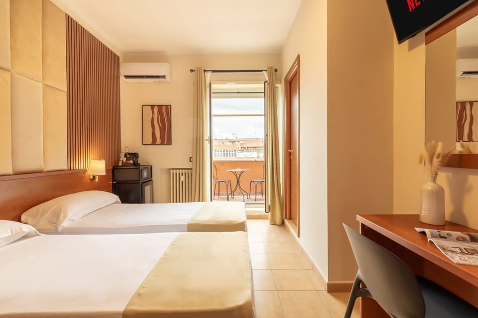 Double or Twin Room, Balcony, City View | In-room safe, desk, free WiFi