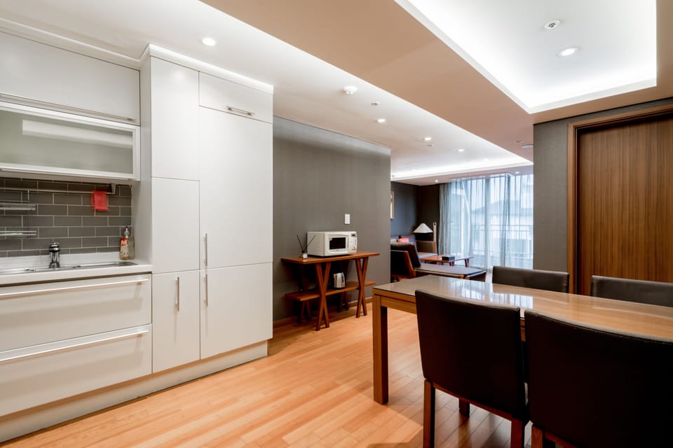 Two Bedroom Deluxe Suite | Living area | LED TV