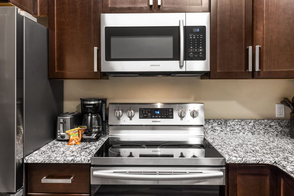 Apartment | Private kitchen | Full-size fridge, microwave, oven, stovetop