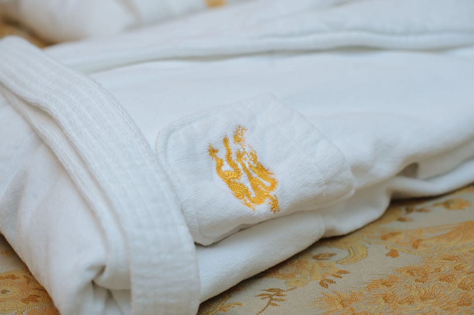 Shower, free toiletries, hair dryer, slippers