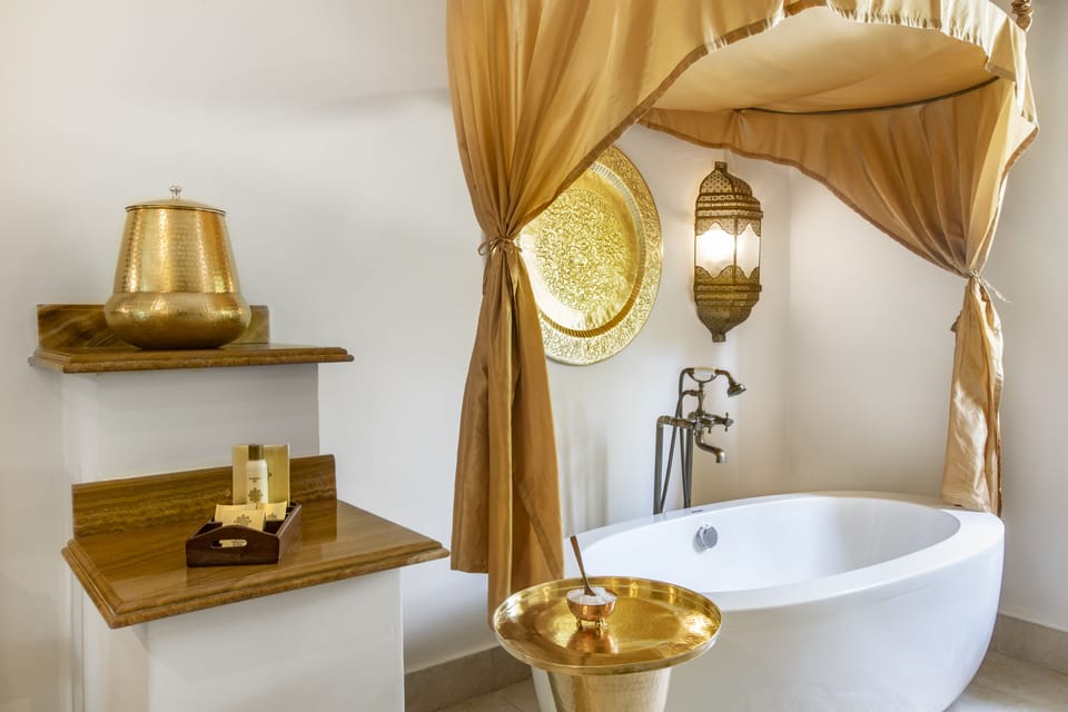 Separate tub and shower, free toiletries, hair dryer, bathrobes