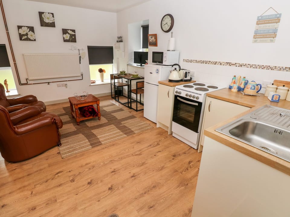 Fridge, electric kettle, toaster, cookware/dishes/utensils