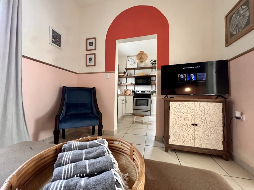 Family Suite | Living room | 62-inch Smart TV with digital channels, Netflix, toys