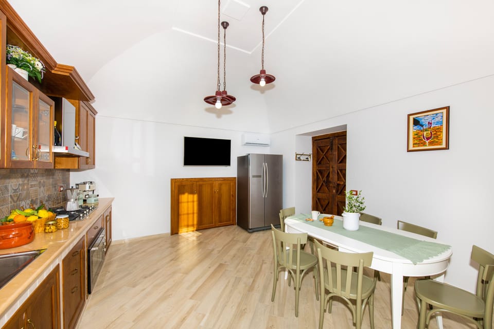 Apartment, 2 Bedrooms, Patio, Sea View | Private kitchen | Espresso maker, fridge, microwave, oven