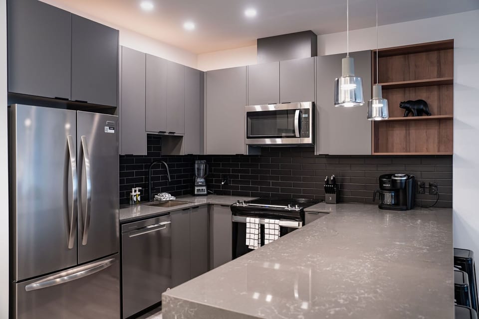 Condo | Private kitchen | Coffee/tea maker, fridge, microwave, oven