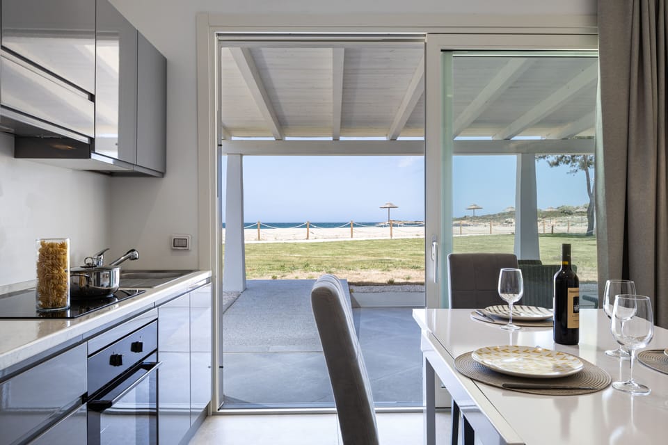 Luxury Suite | Private kitchen | Oven, stovetop, dishwasher, espresso maker