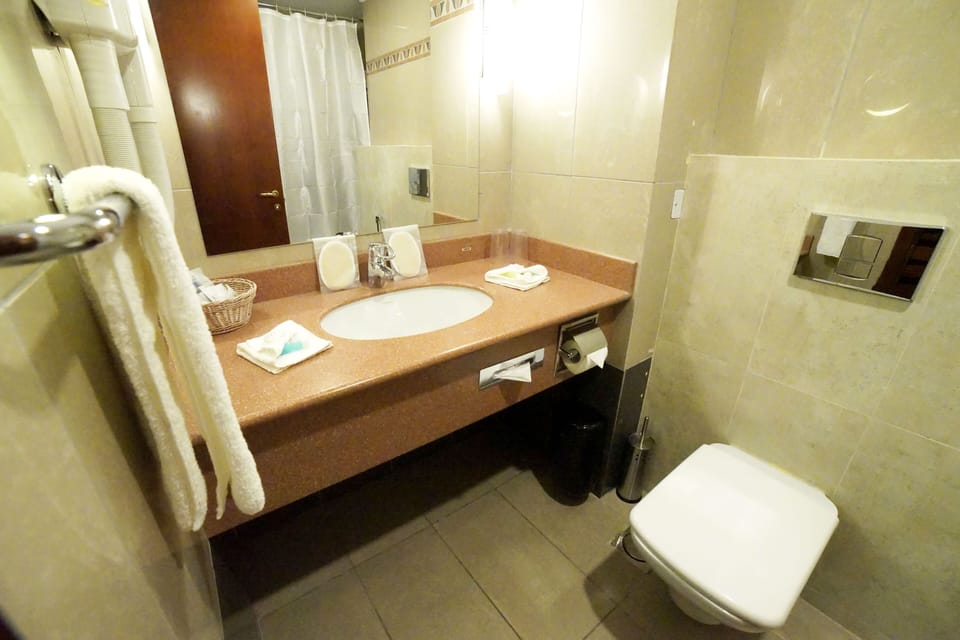 Bathtub, free toiletries, hair dryer, bathrobes