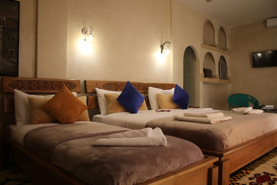Chambre Prémium Mariam | Frette Italian sheets, premium bedding, down comforters