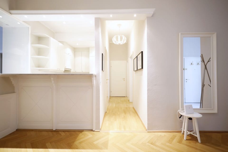 Deluxe Apartment | Living area | 40-inch LCD TV with cable channels