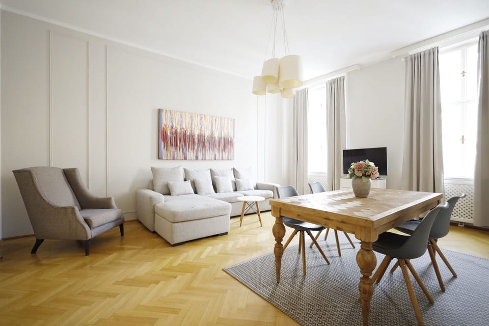 Deluxe Apartment | Living area | 40-inch LCD TV with cable channels