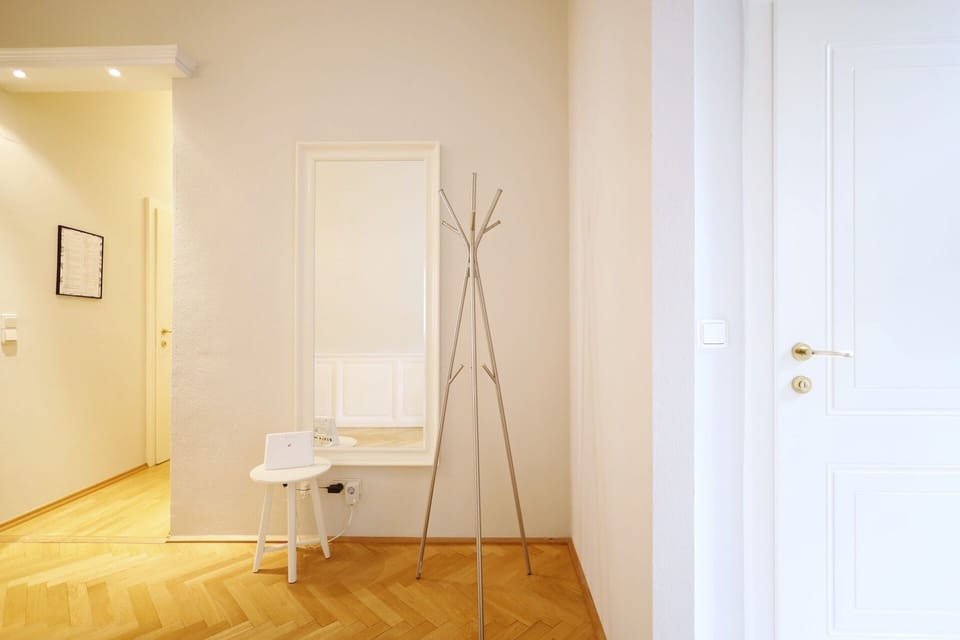 Deluxe Apartment | Living area | 40-inch LCD TV with cable channels