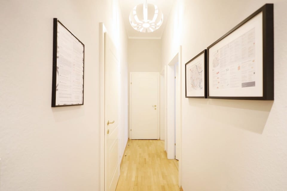 Deluxe Apartment | Living area | 40-inch LCD TV with cable channels