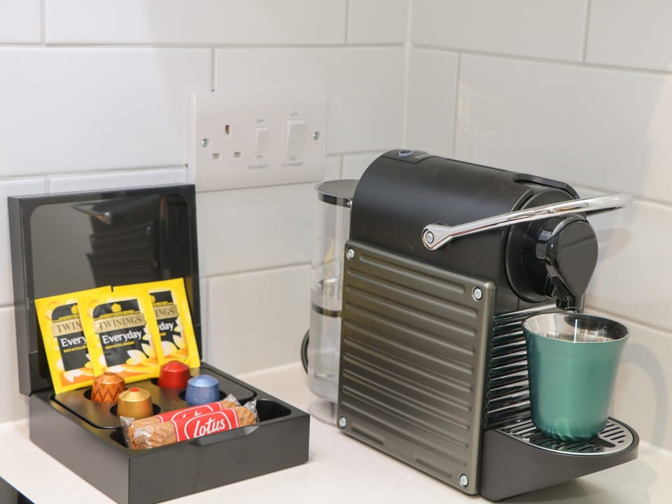 Fridge, electric kettle, toaster, cookware/dishes/utensils