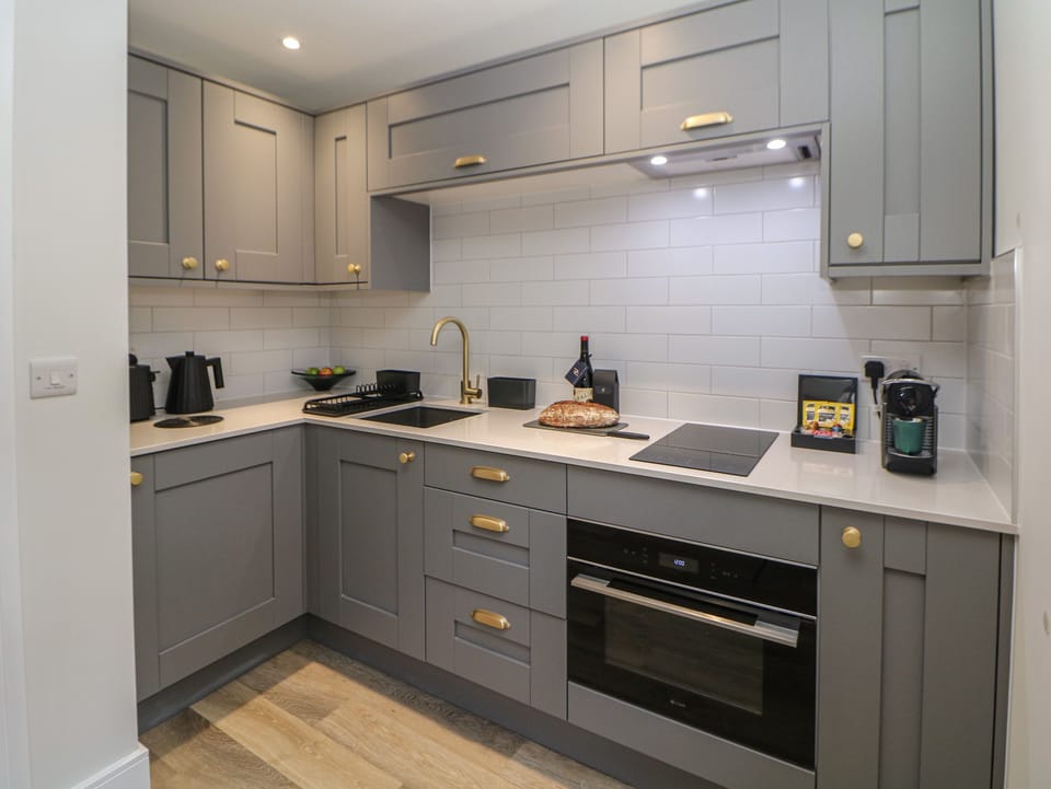 Fridge, electric kettle, toaster, cookware/dishes/utensils