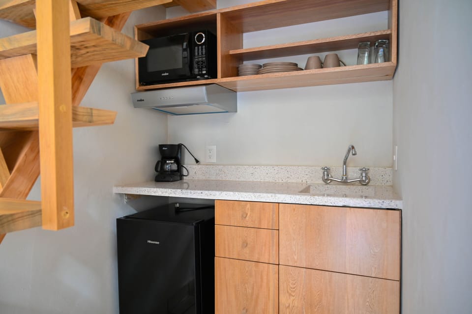 Microwave, blender, cookware/dishes/utensils