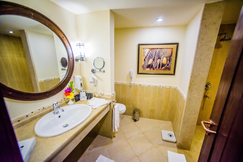 Executive Suite, 2 Bedrooms | Bathroom | Shower, free toiletries, hair dryer, towels