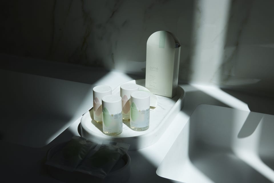 Designer toiletries, hair dryer, bathrobes, slippers