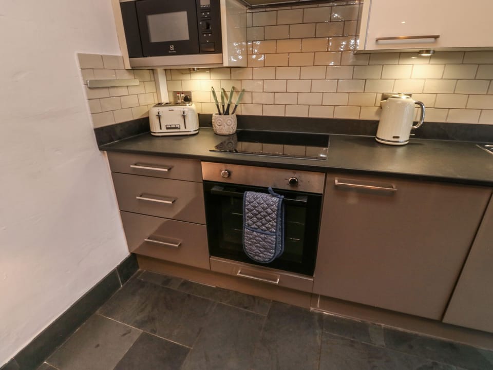 Fridge, electric kettle, toaster, cookware/dishes/utensils