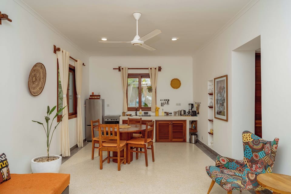 Babu Villa | Living area | 48-inch Smart TV with digital channels, Netflix, streaming services