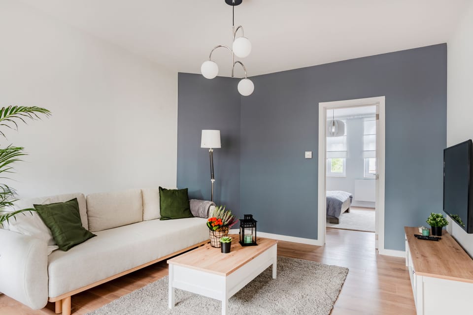Comfort Apartment | Living area | Flat-screen TV