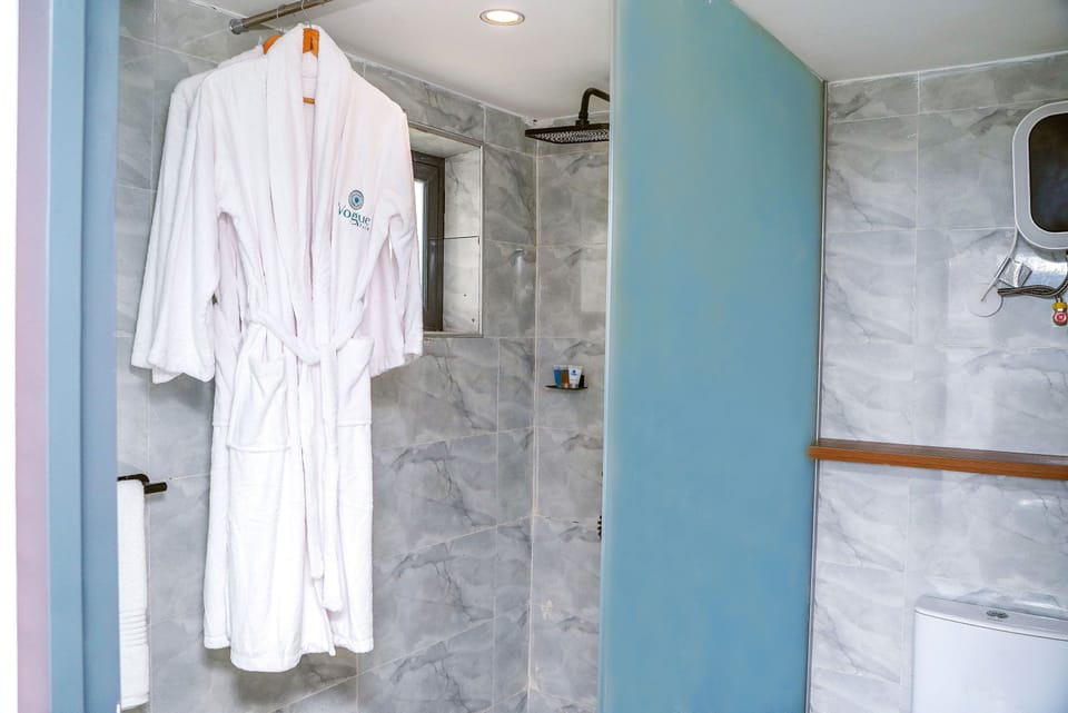 Shower, rainfall showerhead, bathrobes, slippers