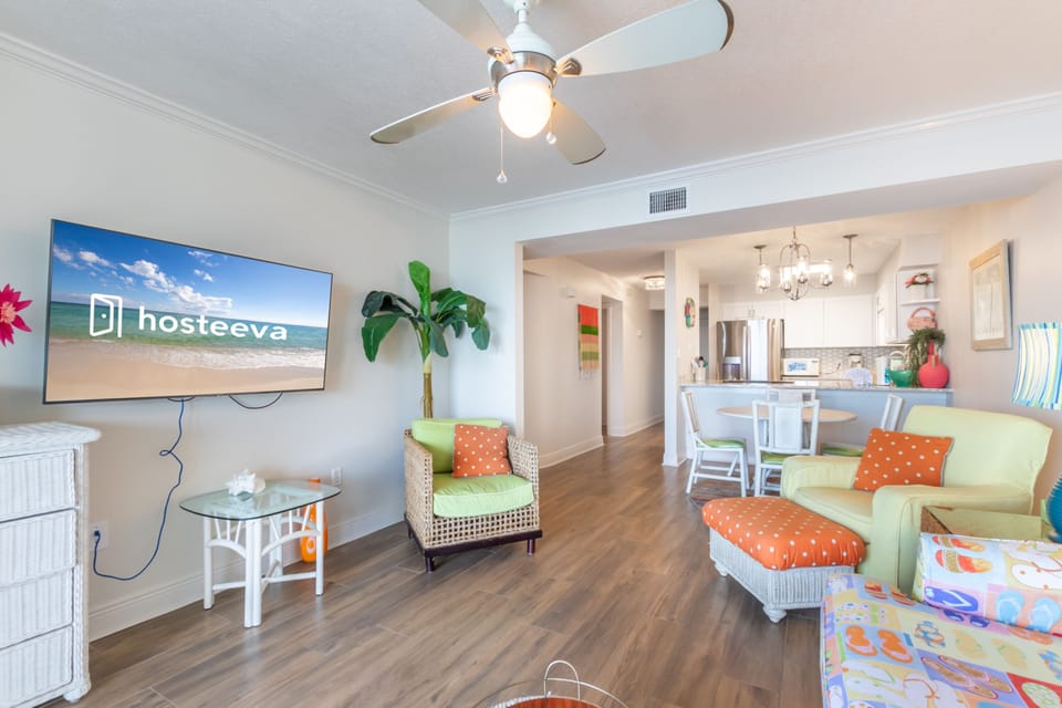 Comfort Condo, 2 Bedrooms, Balcony, Lagoon View | Living room | 55-inch Smart TV with cable channels