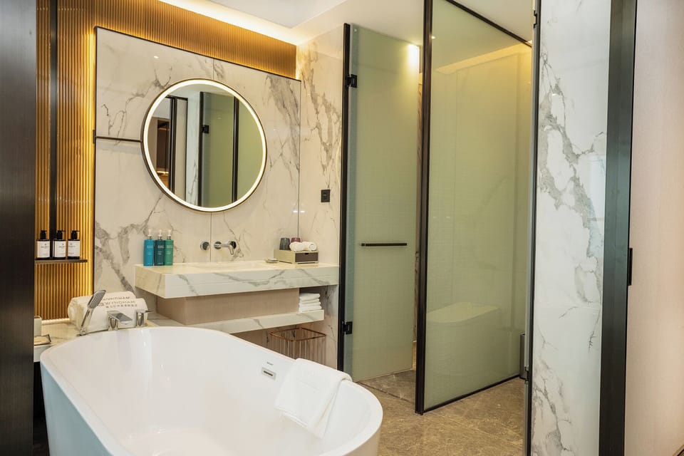 Deluxe Room, 2 Twin Beds, Non Smoking, City View | Minibar, in-room safe, blackout drapes, iron/ironing board