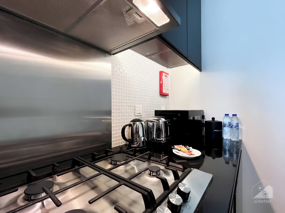 Apartment (1 Bedroom) | Private kitchen | Microwave, oven, stovetop, dishwasher