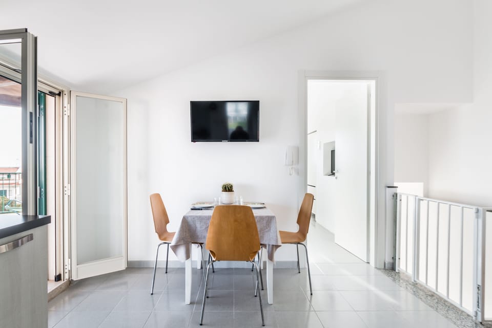 Comfort Apartment | Living area | 37-inch flat-screen TV with cable channels