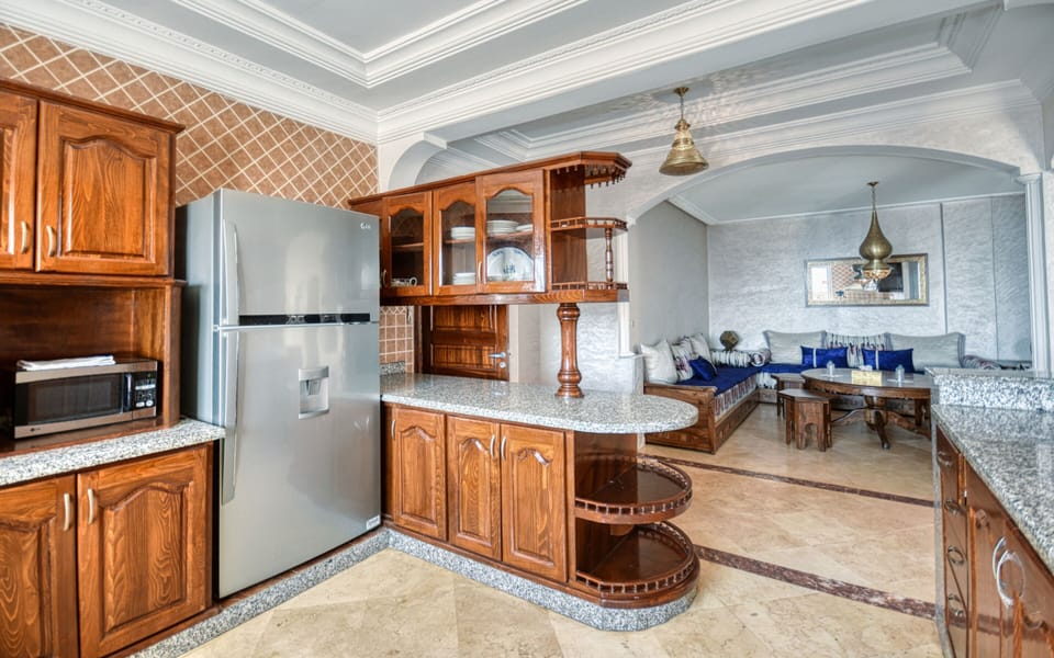 Apartment, Ensuite, Sea View | Private kitchen | Highchair
