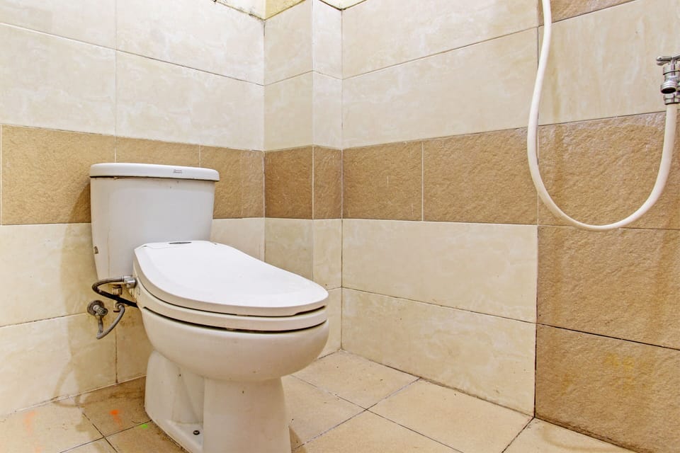 Standard Double Room | Bathroom | Shower, towels, soap