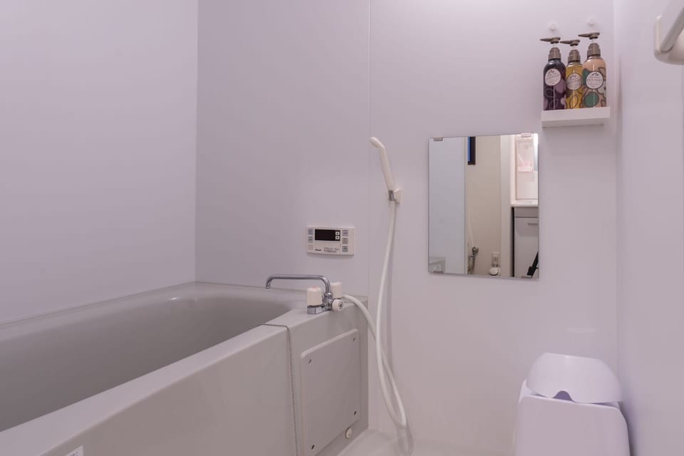 Comfort Double Room, 1 Double Bed, Ground Floor | Bathroom | Separate tub and shower, rainfall showerhead, hair dryer, slippers
