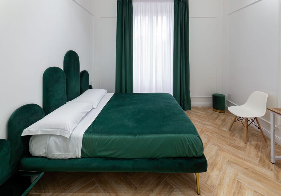 Superior Quadruple Room | Desk, blackout drapes, soundproofing, iron/ironing board