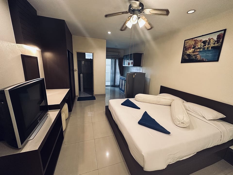 Business Condo, City View | 1 bedroom, blackout drapes, soundproofing, iron/ironing board