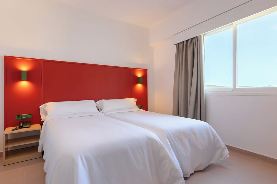 Basic Twin Room, 2 Twin Beds, City View | Hypo-allergenic bedding available, in-room safe, desk, laptop workspace