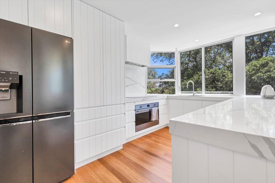 Exclusive Apartment | Private kitchen | Full-size fridge, microwave, oven, stovetop