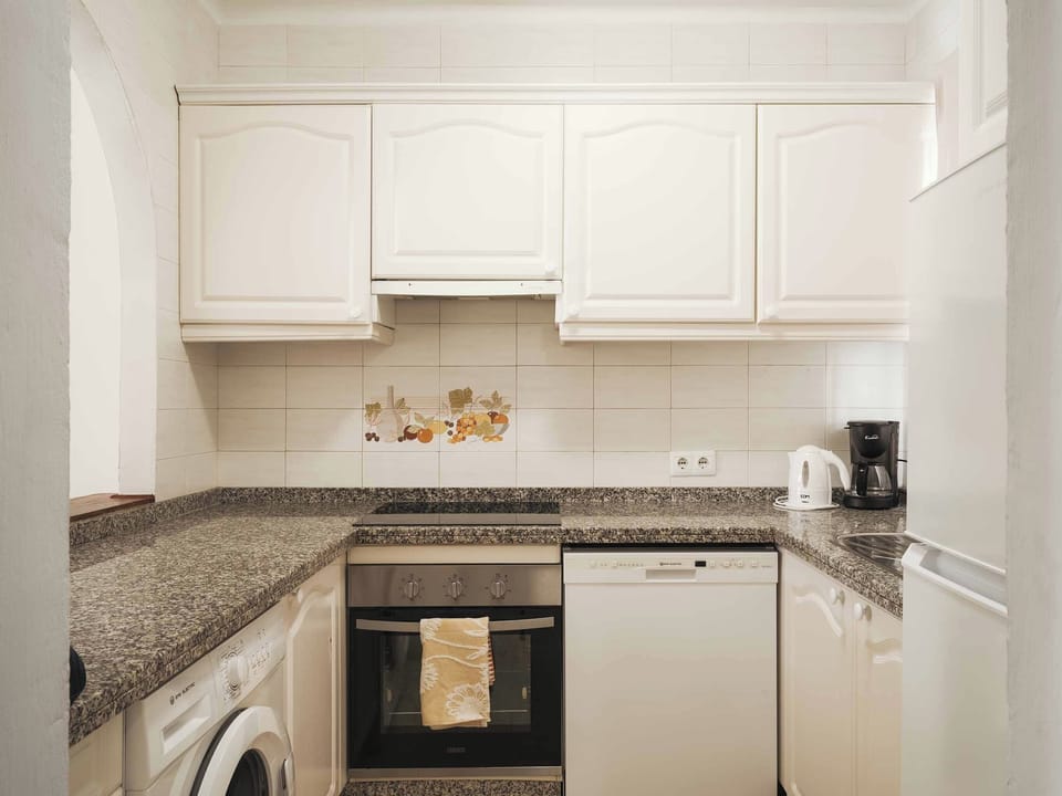 Coffee/tea maker, fridge, microwave, highchair