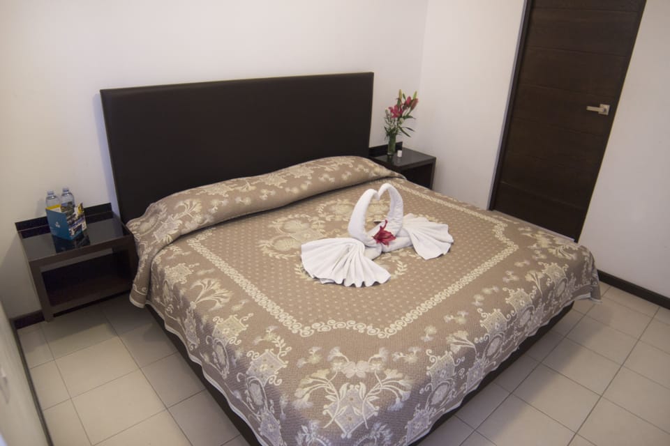 Standard Room, 1 Double Bed | Down comforters, blackout drapes, iron/ironing board, free WiFi