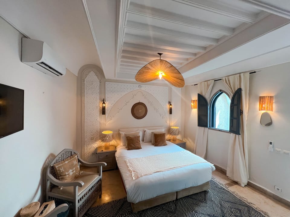 Deluxe Double or Twin Room, Refrigerator, Courtyard Area | In-room safe, cribs/infant beds, rollaway beds, free WiFi