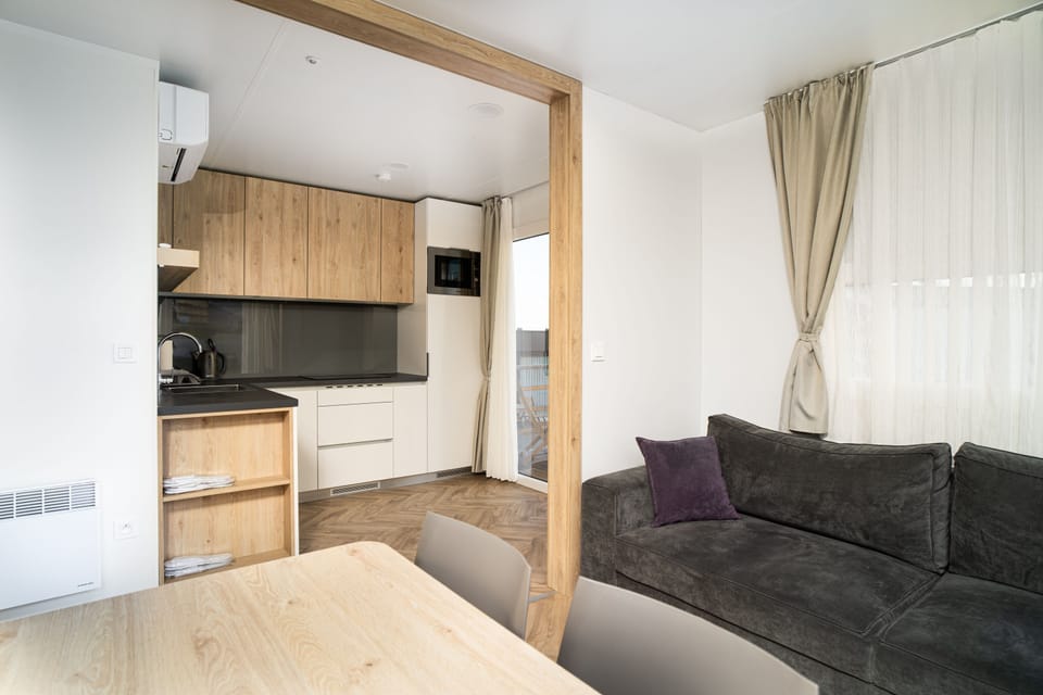 Family Apartment | Living area | 80-cm Smart TV with satellite channels