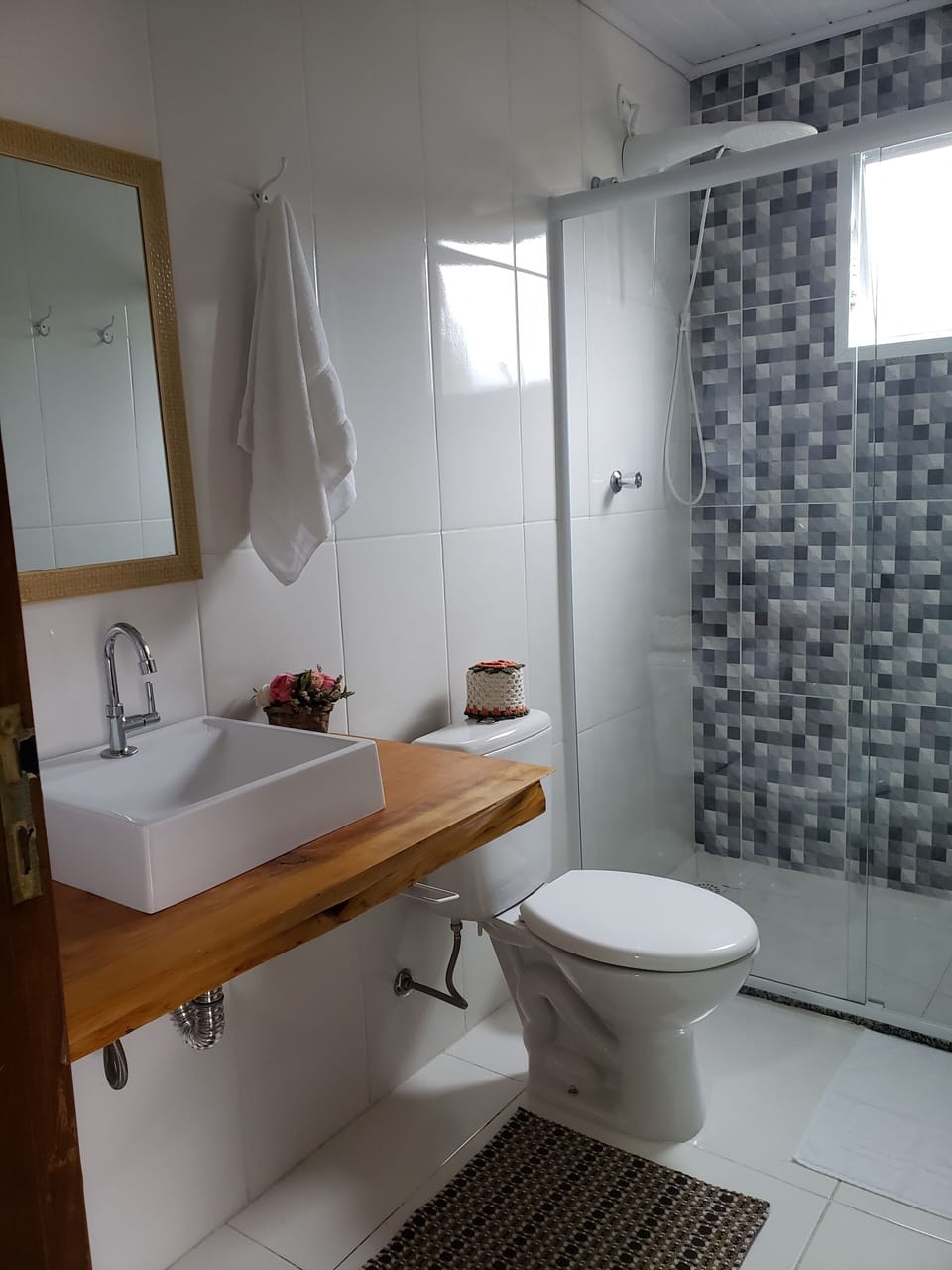 Shower, rainfall showerhead, designer toiletries, hair dryer