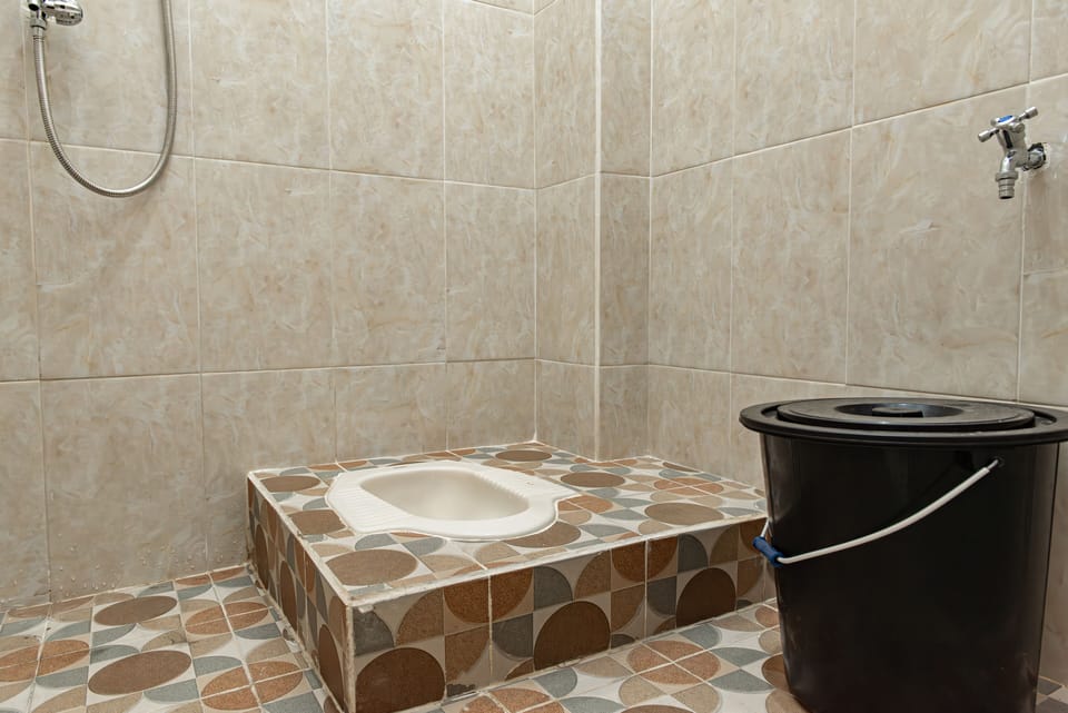 Economy Twin Room | Bathroom | Shower, soap