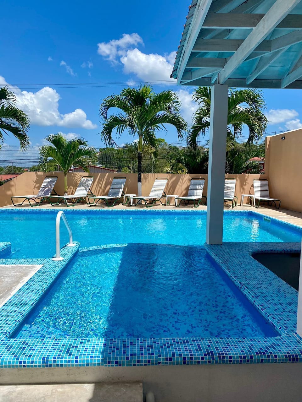 Outdoor pool, open 9 AM to 8 PM, pool umbrellas, sun loungers