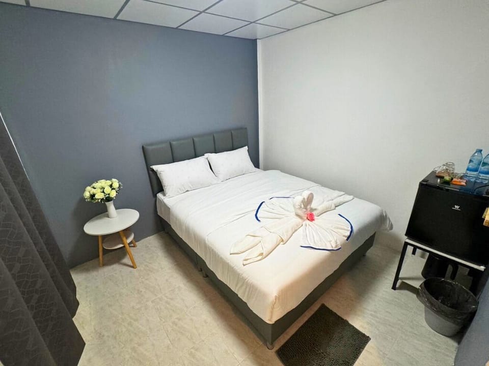 Basic Double Room | Minibar (free items), blackout drapes, iron/ironing board (on request)