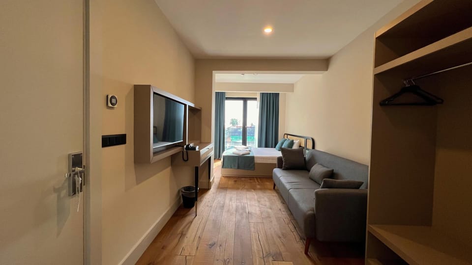 Deluxe Double Room, 1 King Bed with Sofa bed, Non Smoking, Sea View | Premium bedding, in-room safe, iron/ironing board, free WiFi